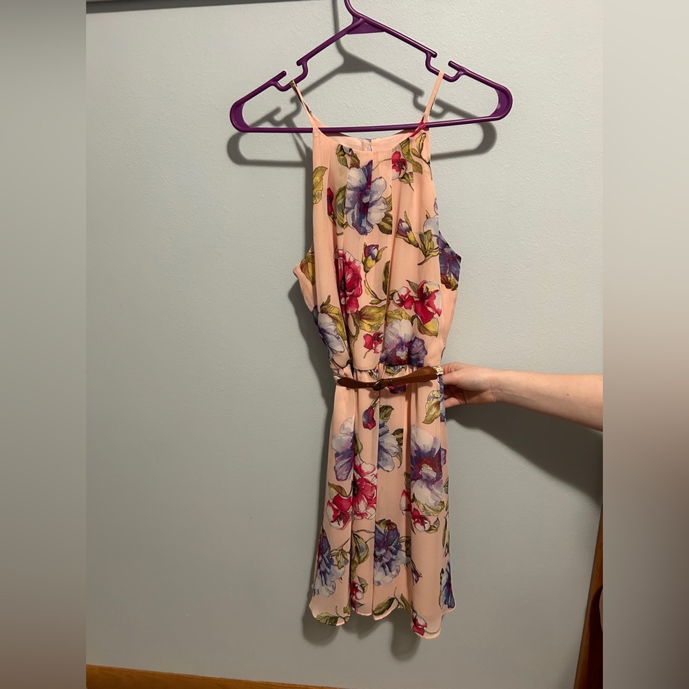 Junior size medium lined ballet pink color sleeveless floral dress. Gently used